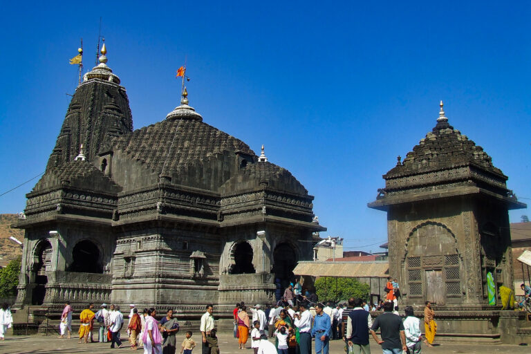 Trimbakeshwar temple Nashik with devotees visiting Jyotirlinga shrine for darshan and puja